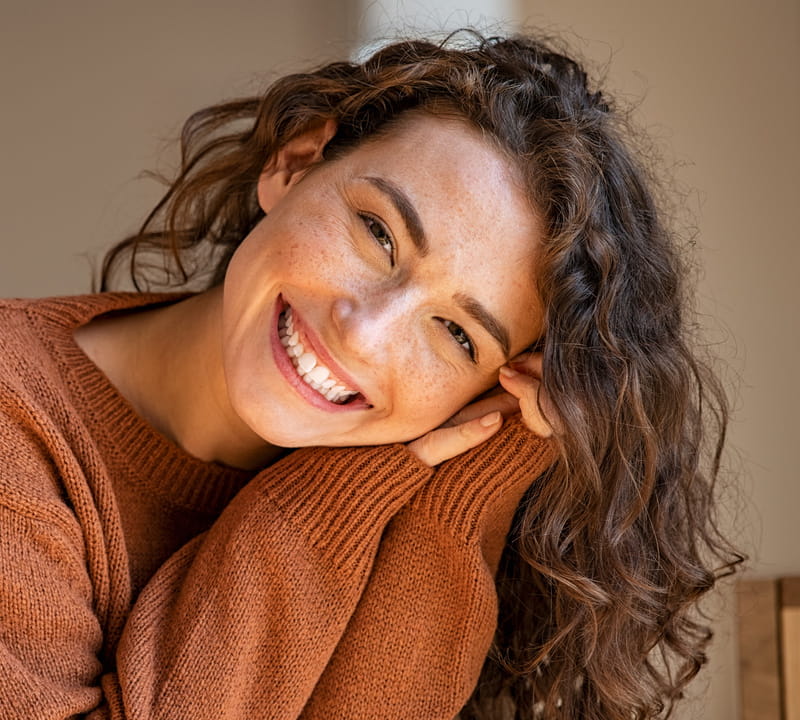 smiling patient happy with the dental cleanings at The Smile Sanctuary in Aubrey TX